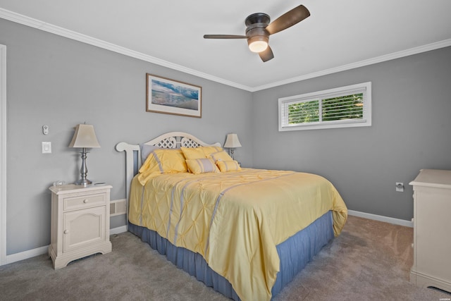 bedroom featuring baseboards, carpet flooring, a ceiling fan, and crown molding