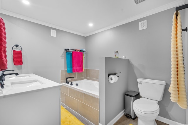 bathroom featuring a garden tub, toilet, visible vents, baseboards, and ornamental molding