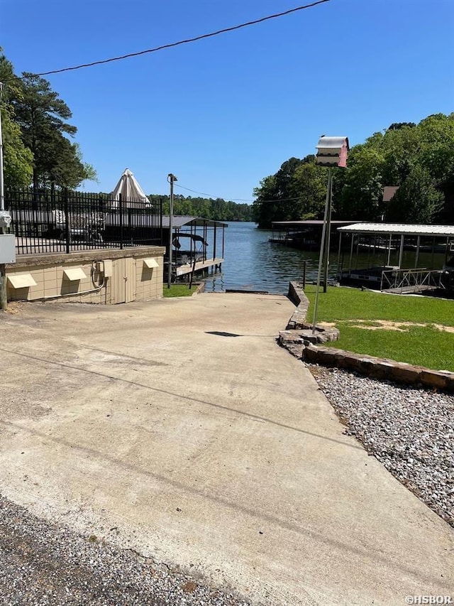 611 Lakeland Unit 30, Hot Springs, AR 71913 - dock area with a water view and a boat ramp