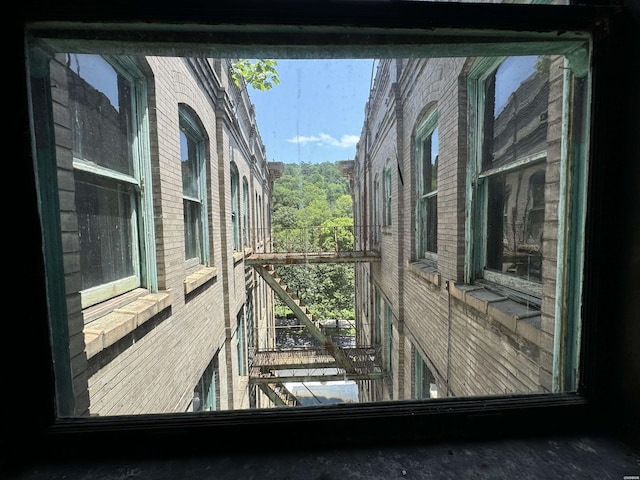 view of property exterior featuring brick siding