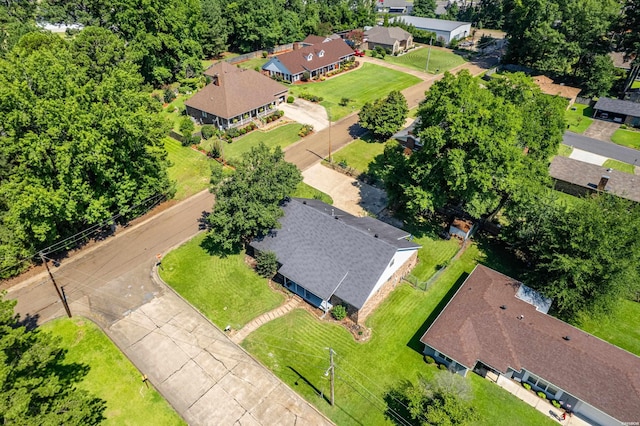 birds eye view of property with a residential view