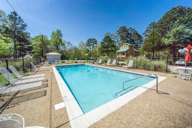 301 Kleinshore Rd Unit 17, Hot Springs, AR 71913 - community pool featuring a patio area and view of wooded area