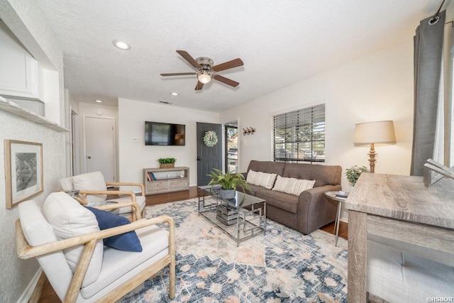 301 Kleinshore Rd Unit 17, Hot Springs, AR 71913 - living room featuring a ceiling fan, a textured ceiling, recessed lighting, wood finished floors, and baseboards