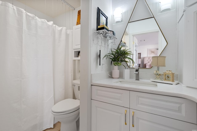 bathroom featuring a shower with curtain, toilet, and vanity