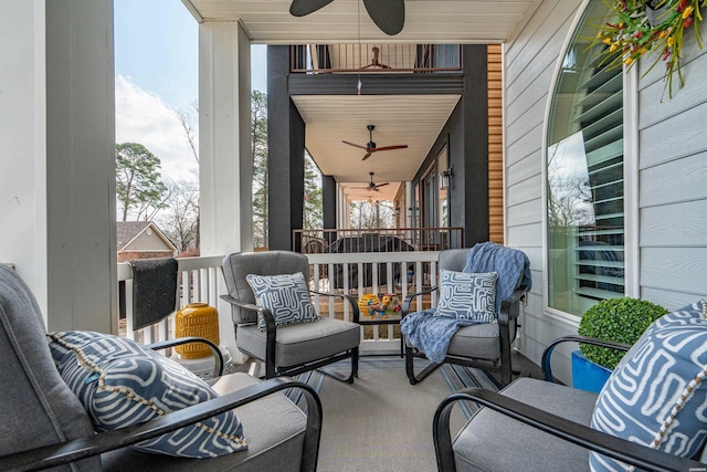 view of patio featuring ceiling fan