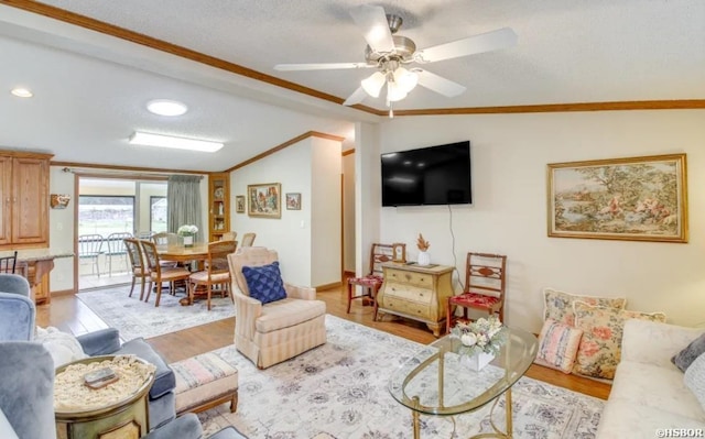 130,133,150 Treasure Isle Road, Hot Springs, AR 71913 - living area with ceiling fan, lofted ceiling, wood finished floors, and ornamental molding