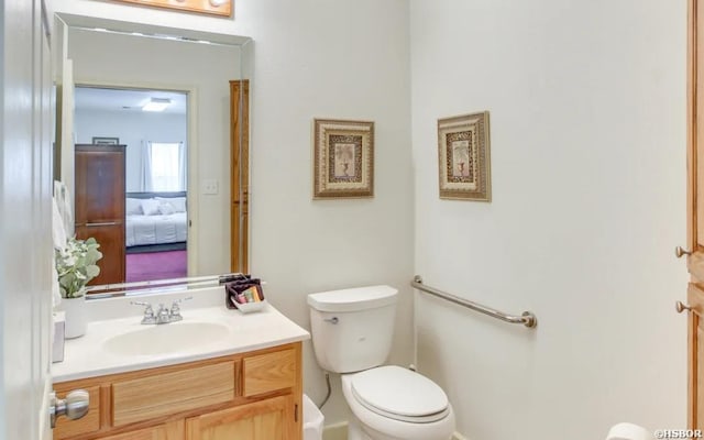130,133,150 Treasure Isle Road, Hot Springs, AR 71913 - bathroom with toilet, vanity, and ensuite bathroom