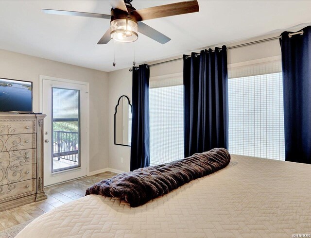 bedroom featuring a ceiling fan and access to outside