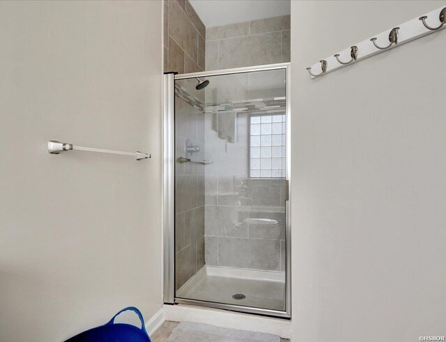 bathroom with a stall shower