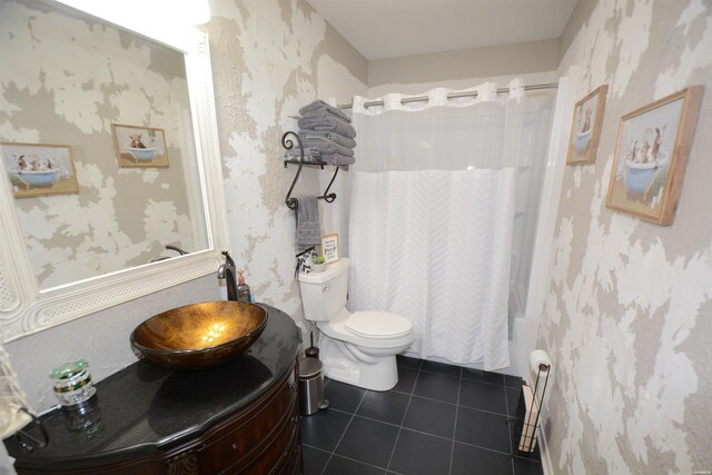 bathroom with toilet, wallpapered walls, shower / tub combo with curtain, and tile patterned floors