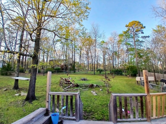 view of home's community with a yard