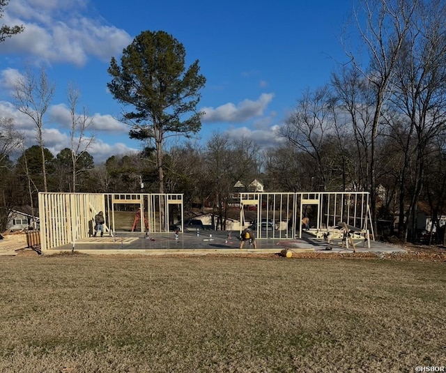 community jungle gym with a yard