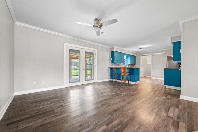 1204 Marion Anderson Rd, Hot Springs, AR 71913 - unfurnished living room with french doors, crown molding, a ceiling fan, and dark wood-style floors