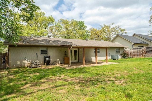 1204 Marion Anderson Rd, Hot Springs, AR 71913 - rear view of house with french doors and a patio area