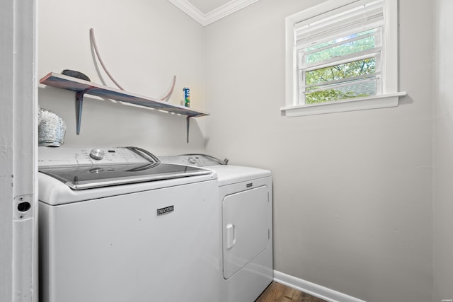 1204 Marion Anderson Rd, Hot Springs, AR 71913 - clothes washing area with baseboards, laundry area, crown molding, wood finished floors, and washer and clothes dryer