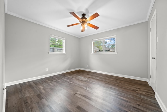 1204 Marion Anderson Rd, Hot Springs, AR 71913 - empty room featuring dark wood-type flooring, a healthy amount of sunlight, ceiling fan, and baseboards