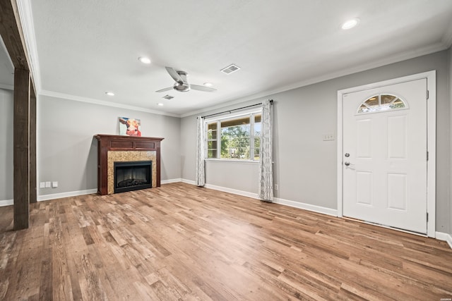 1204 Marion Anderson Rd, Hot Springs, AR 71913 - unfurnished living room with ceiling fan, light wood-type flooring, a fireplace, recessed lighting, and crown molding