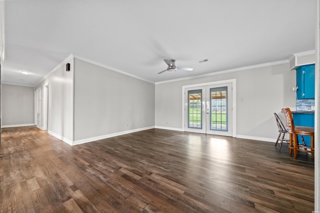 1204 Marion Anderson Rd, Hot Springs, AR 71913 - unfurnished living room with crown molding, dark wood-style flooring, baseboards, and a ceiling fan