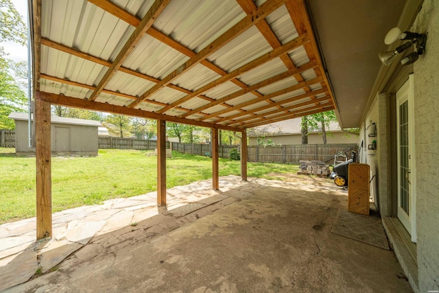 1204 Marion Anderson Rd, Hot Springs, AR 71913 - view of patio featuring a storage shed, an outbuilding, and a fenced backyard