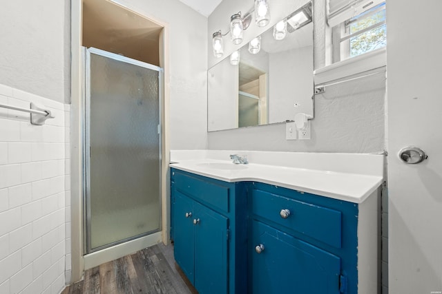 1204 Marion Anderson Rd, Hot Springs, AR 71913 - full bathroom with a stall shower, wood finished floors, and vanity