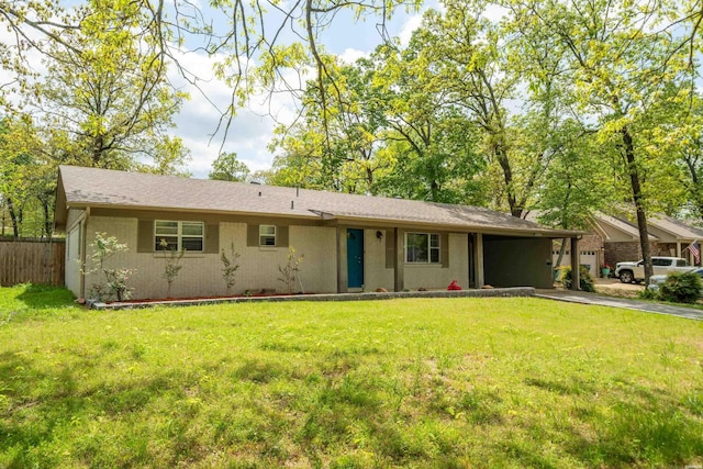 1204 Marion Anderson Rd, Hot Springs, AR 71913 - ranch-style home with aphalt driveway, a front yard, an attached carport, and fence