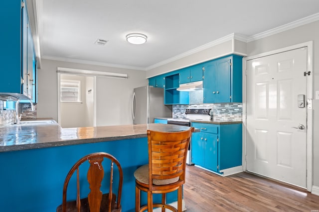 1204 Marion Anderson Rd, Hot Springs, AR 71913 - kitchen featuring ornamental molding, freestanding refrigerator, electric stove, under cabinet range hood, and blue cabinetry