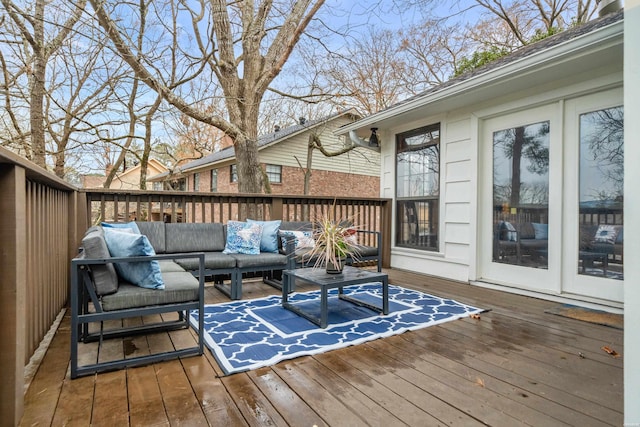 wooden deck with outdoor lounge area