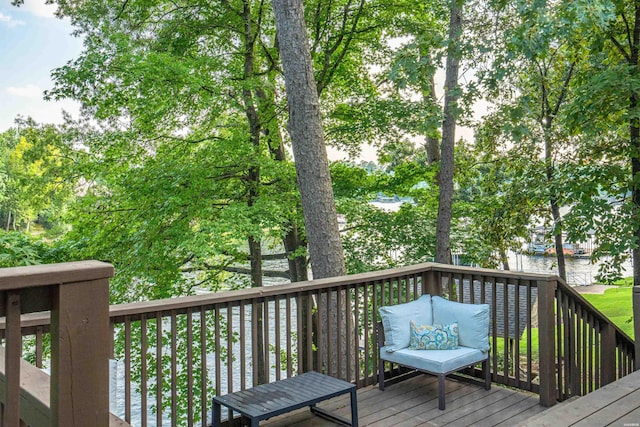 wooden deck with a water view