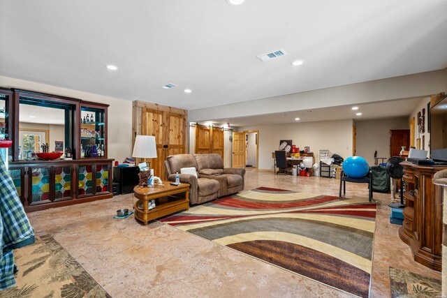 living room with visible vents and recessed lighting