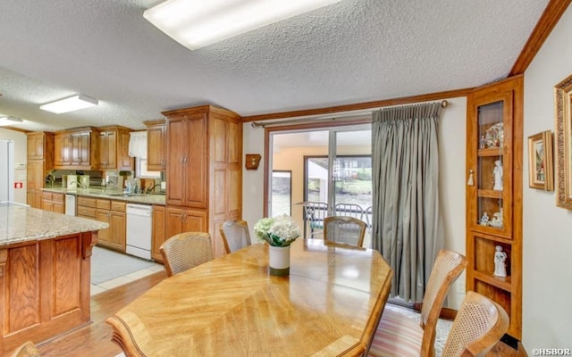 133 Treasure Isle Rd, Hot Springs, AR 71913 - dining area with a textured ceiling and light wood-type flooring