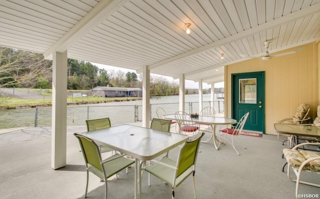133 Treasure Isle Rd, Hot Springs, AR 71913 - view of patio / terrace with a ceiling fan, outdoor dining area, a water view, and fence