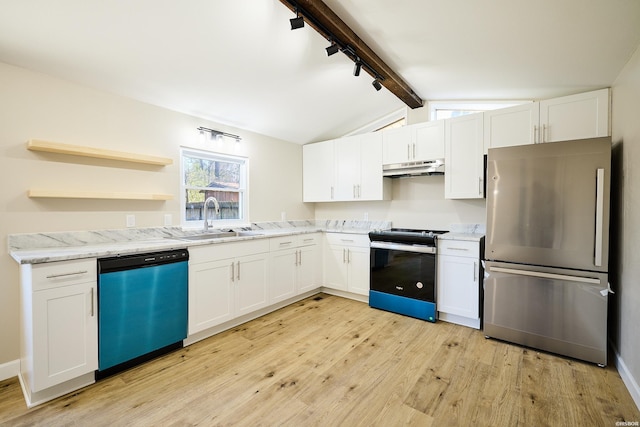 kitchen featuring appliances with stainless steel finishes, white cabinets, a sink, and under cabinet range hood