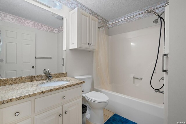 full bathroom with shower / bathtub combination with curtain, toilet, a textured ceiling, vanity, and tile patterned floors