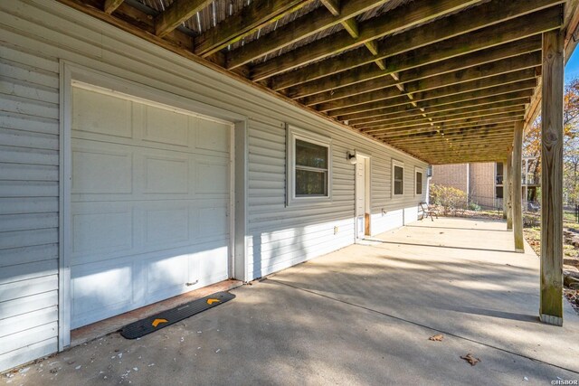 view of patio with a garage