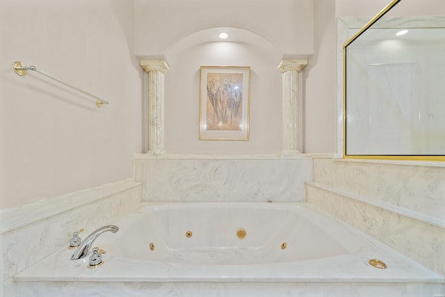 518 Amity Rd Unit E4, Hot Springs, AR 71913 - full bathroom featuring a tub with jets and decorative columns