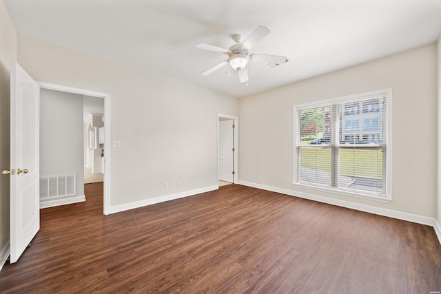 518 Amity Rd Unit E4, Hot Springs, AR 71913 - spare room with dark wood finished floors, visible vents, baseboards, and ceiling fan