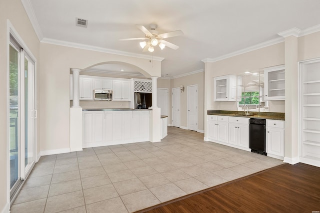 518 Amity Rd Unit E4, Hot Springs, AR 71913 - kitchen with stainless steel microwave, dark countertops, visible vents, black refrigerator with ice dispenser, and ceiling fan
