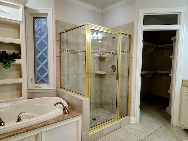 full bath featuring ornamental molding, a shower stall, tile patterned flooring, a bath, and a spacious closet