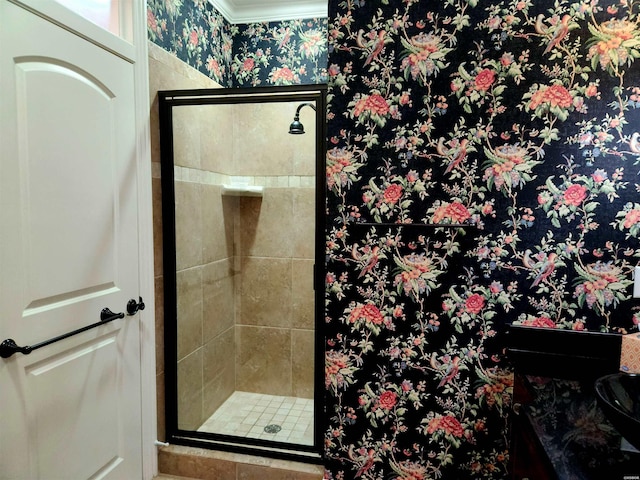 full bath with wallpapered walls and a shower stall