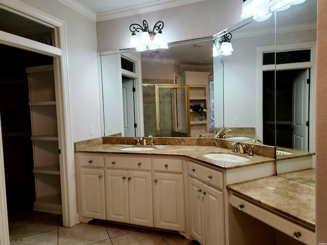 full bath featuring a sink, crown molding, and tile patterned floors