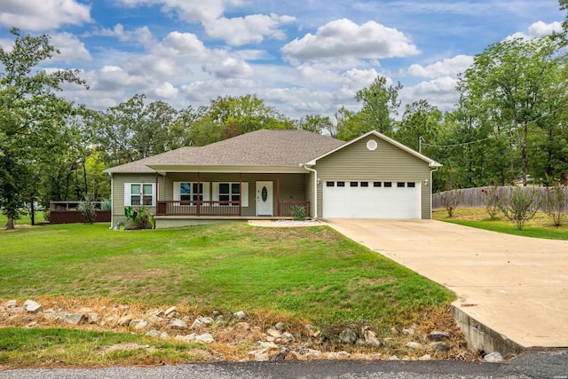 single story home featuring a porch, an attached garage, fence, driveway, and a front yard