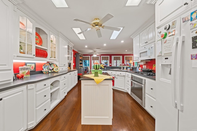 120 Southview Cir, Hot Springs, AR 71913 - kitchen featuring white appliances, a ceiling fan, dark countertops, recessed lighting, and white cabinetry