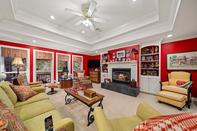 120 Southview Cir, Hot Springs, AR 71913 - carpeted living room featuring a tray ceiling, crown molding, recessed lighting, a ceiling fan, and a fireplace