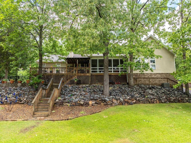 120 Southview Cir, Hot Springs, AR 71913 - back of house featuring stairs, a yard, a deck, and a sunroom