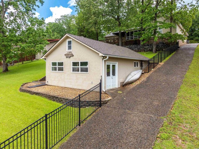 120 Southview Cir, Hot Springs, AR 71913 - view of side of property featuring a fenced backyard and a shingled roof