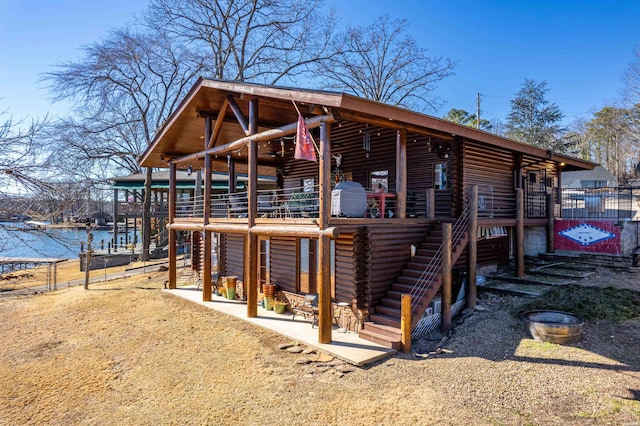 exterior space with a water view