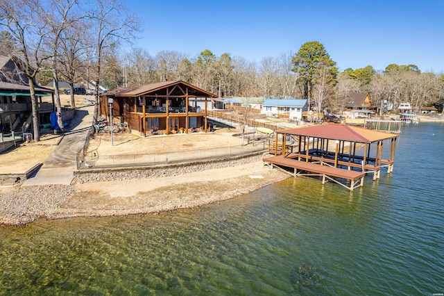 view of dock featuring a water view and boat lift