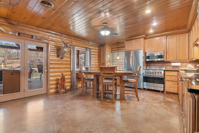 kitchen featuring visible vents, light brown cabinetry, high quality appliances, and recessed lighting