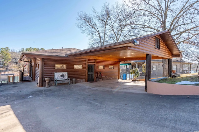 exterior space with a gate and fence