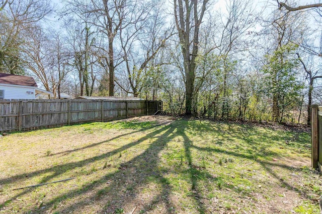 view of yard featuring fence